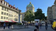 Swiss voters narrowly approve plan for electronic ID cards